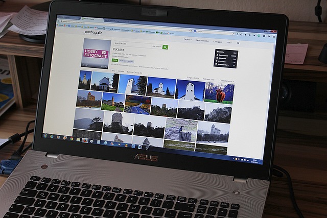 Laptop computer on desk, perfect for web creation